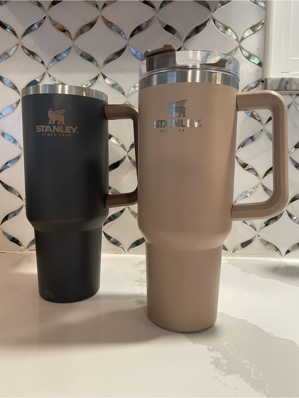 Two Stanley Insulated Travel Mugs — charcoal & taupe.
